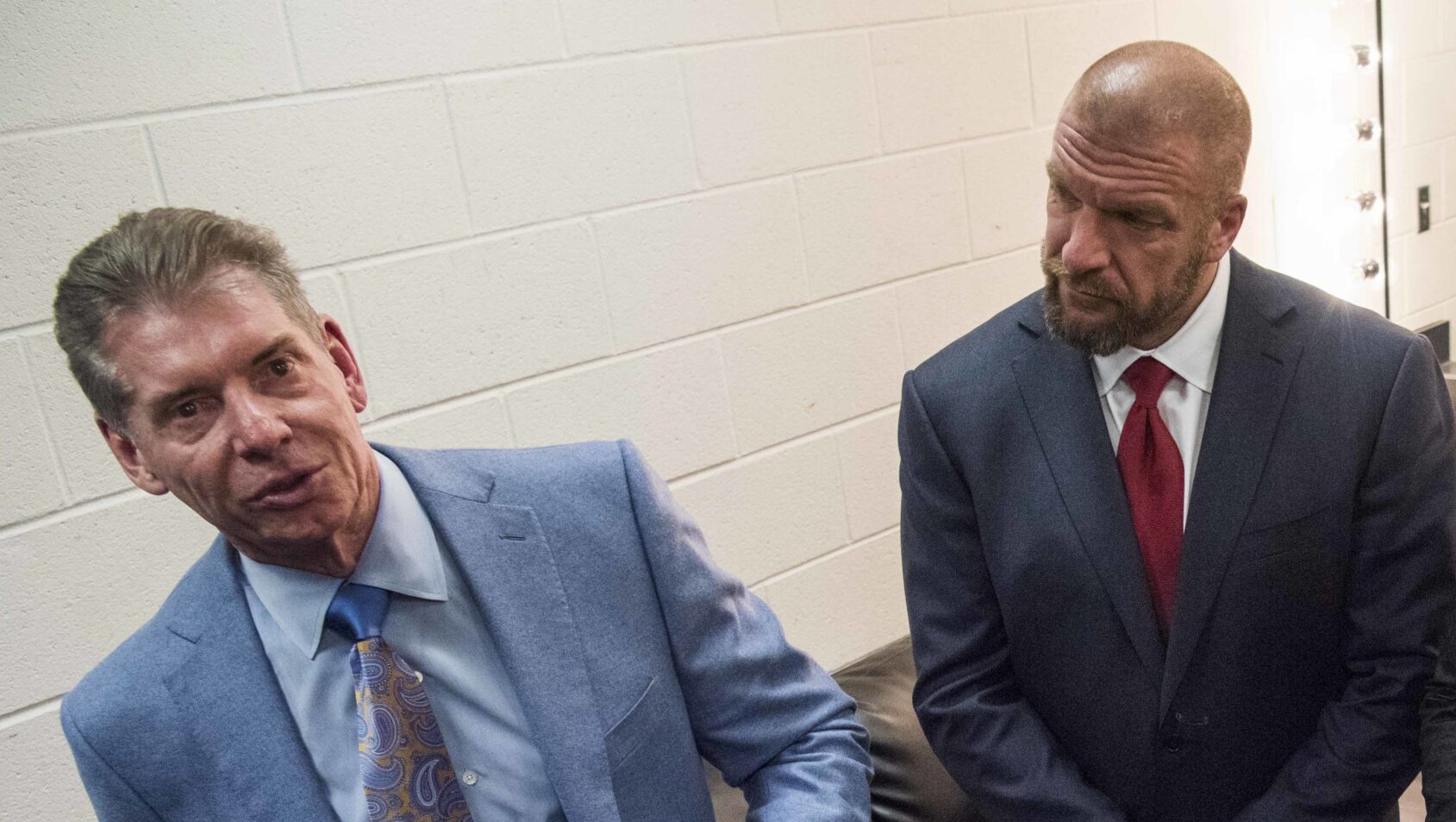 Triple H e Vince McMahon