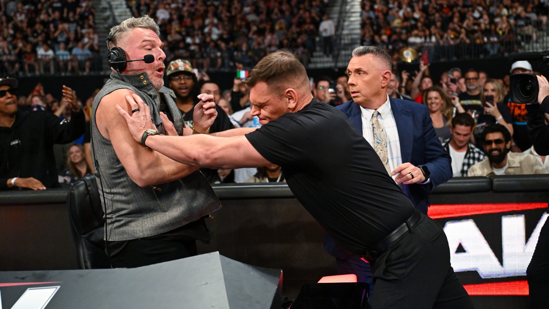 Pat McAfee, Gunther e Michael Cole