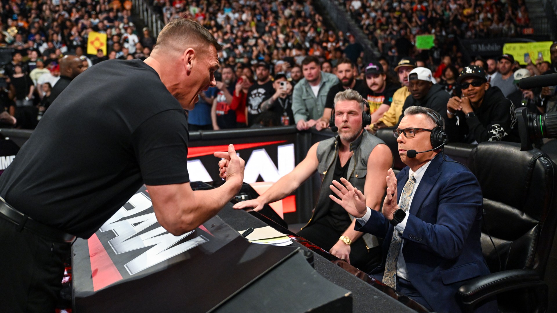 Pat McAfee, Gunther e Michael Cole