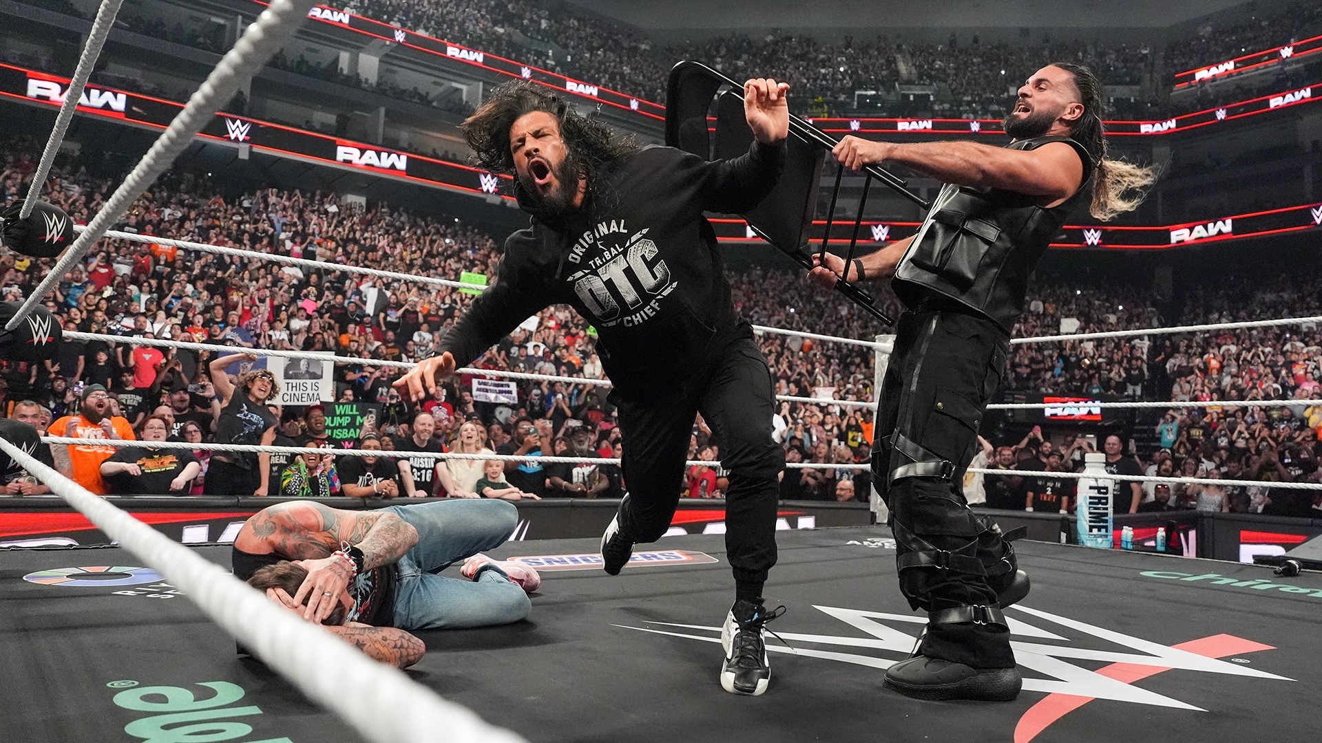 CM Punk, Roman Reigns e Seth Rollins